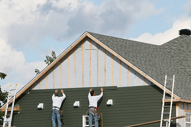 Professional Siding Replacement technician working in North Garden, VA